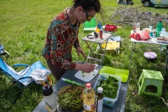 Making salad of what we've picked in the forest yesterday!