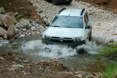 Duster crossing the Black river