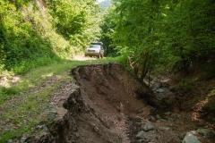 The edge is still crumbling away, so trying to sneak by with 2+ tons of weight would be completely irresponsible